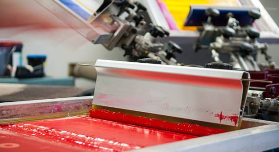 Screen Printing/Silk Screening squeegee in red ink